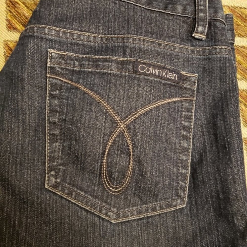 CALVIN KLEIN low rise baby boot cut 32/14